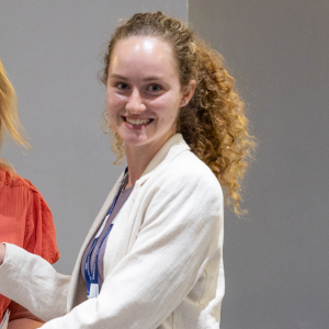 Image of person receiving certificate.