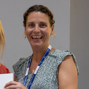 Image of person receiving certificate.