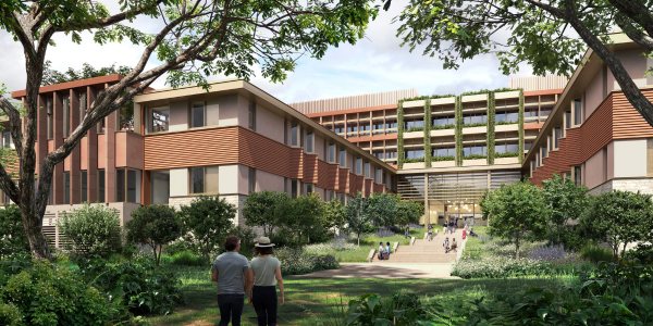 Rendered image of several buildings in a leafy campus.