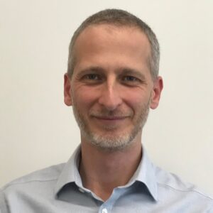 A man in a blue shirt